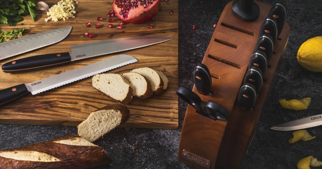 Cutlery set in block and on cutting board with bread