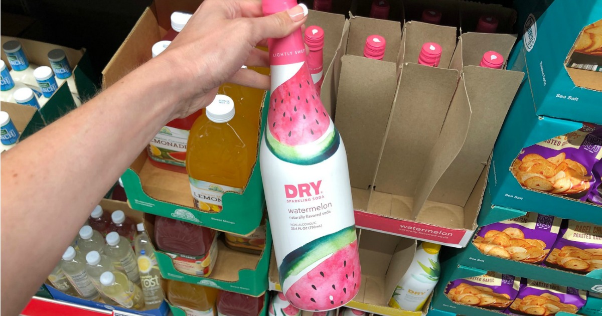 DRY watermelon sparkling soda bottle being held up in store