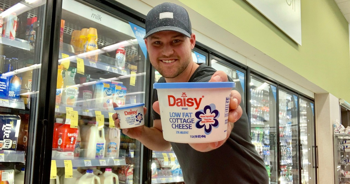 man holding daisy cottage cheese at walgreens