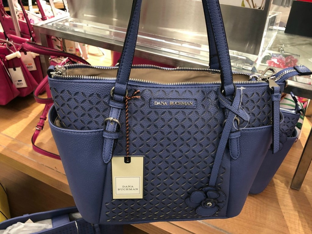 purple purse hanging in store display