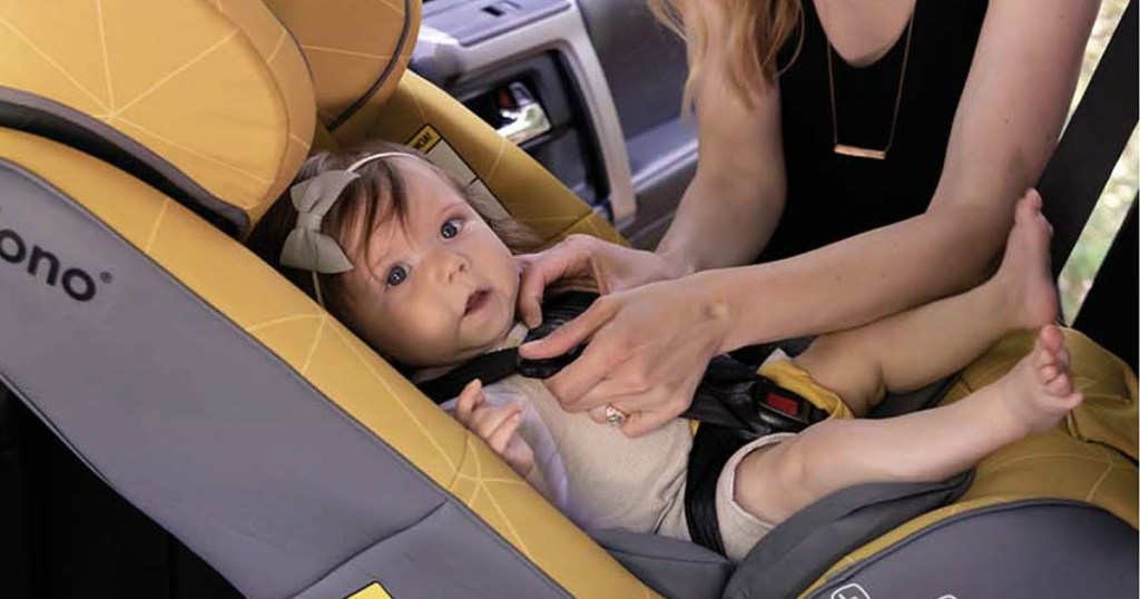 Baby buckled into yellow Diono Radian 3RXT Car Seat