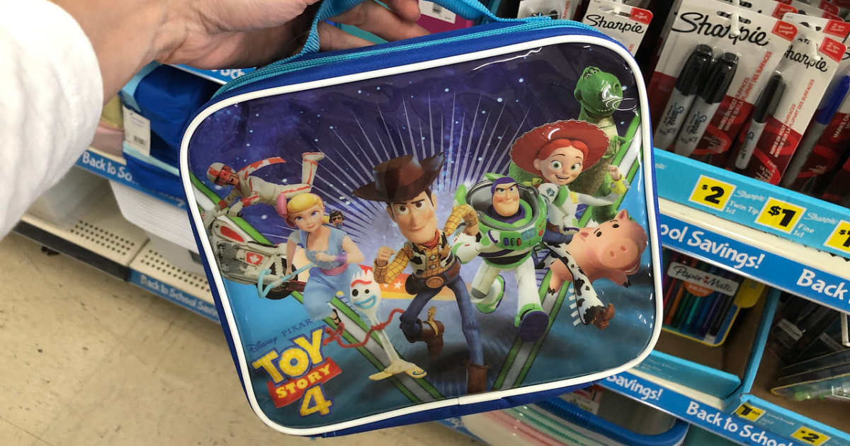woman holding disney toy story lunch bag at dollar general