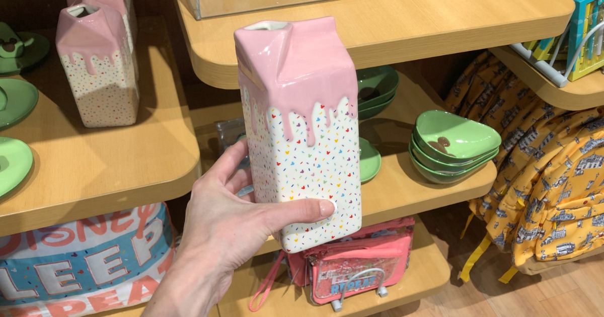 Woman holding Disney Mickey Mouse Milk Carton Vase