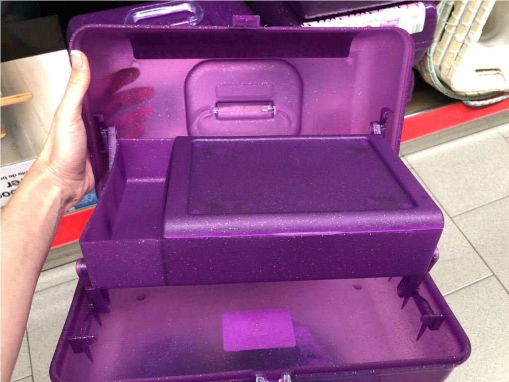 sparkly purple cosmetic organizer opened to reveal compartments