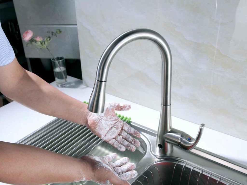 FLOW Motion Sensor Kitchen Faucet with person was dirty hands using motion sensor