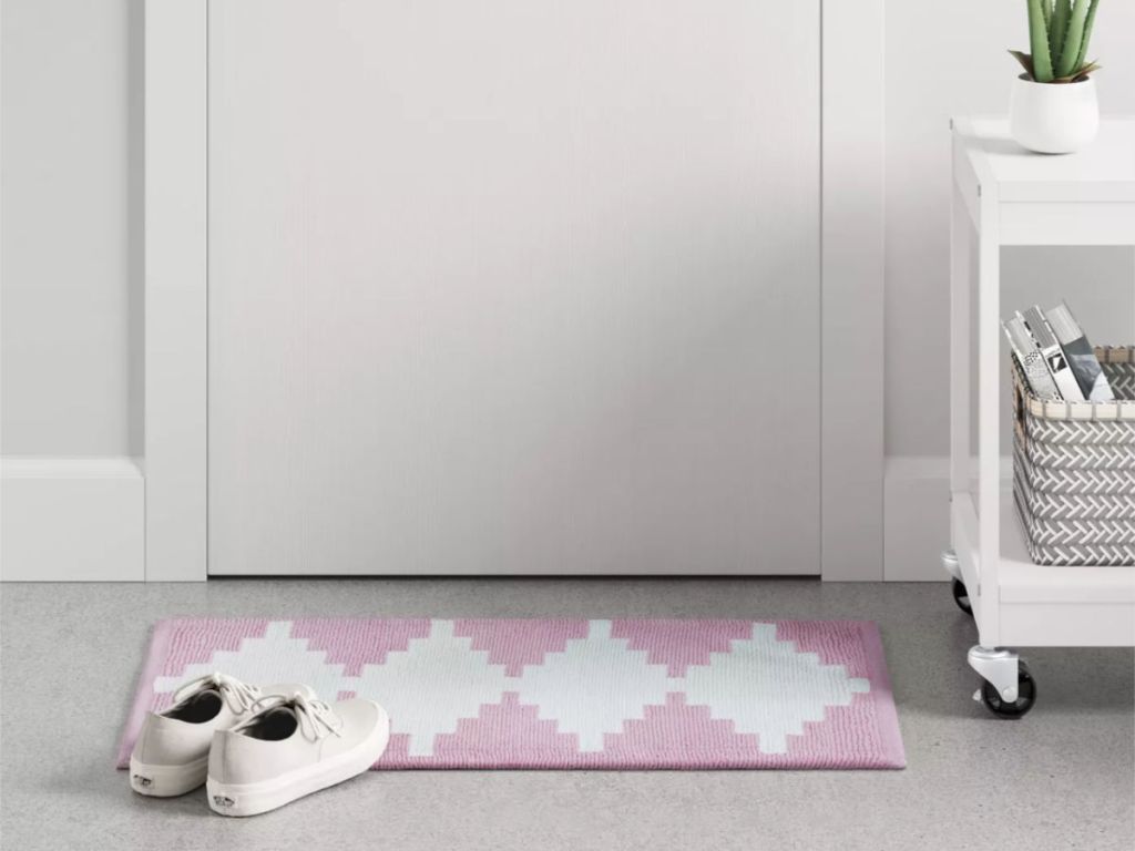 pink Geometric Woven Accent Rug Pink Room Essentials with white shoes