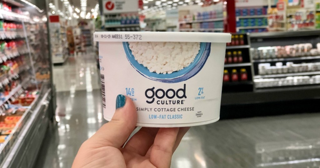 woman holding Good Culture cottage cheese in store