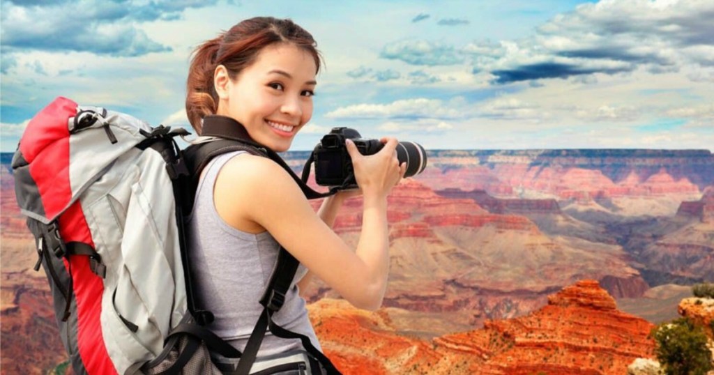 Woman taking pictures at Grand Canyon