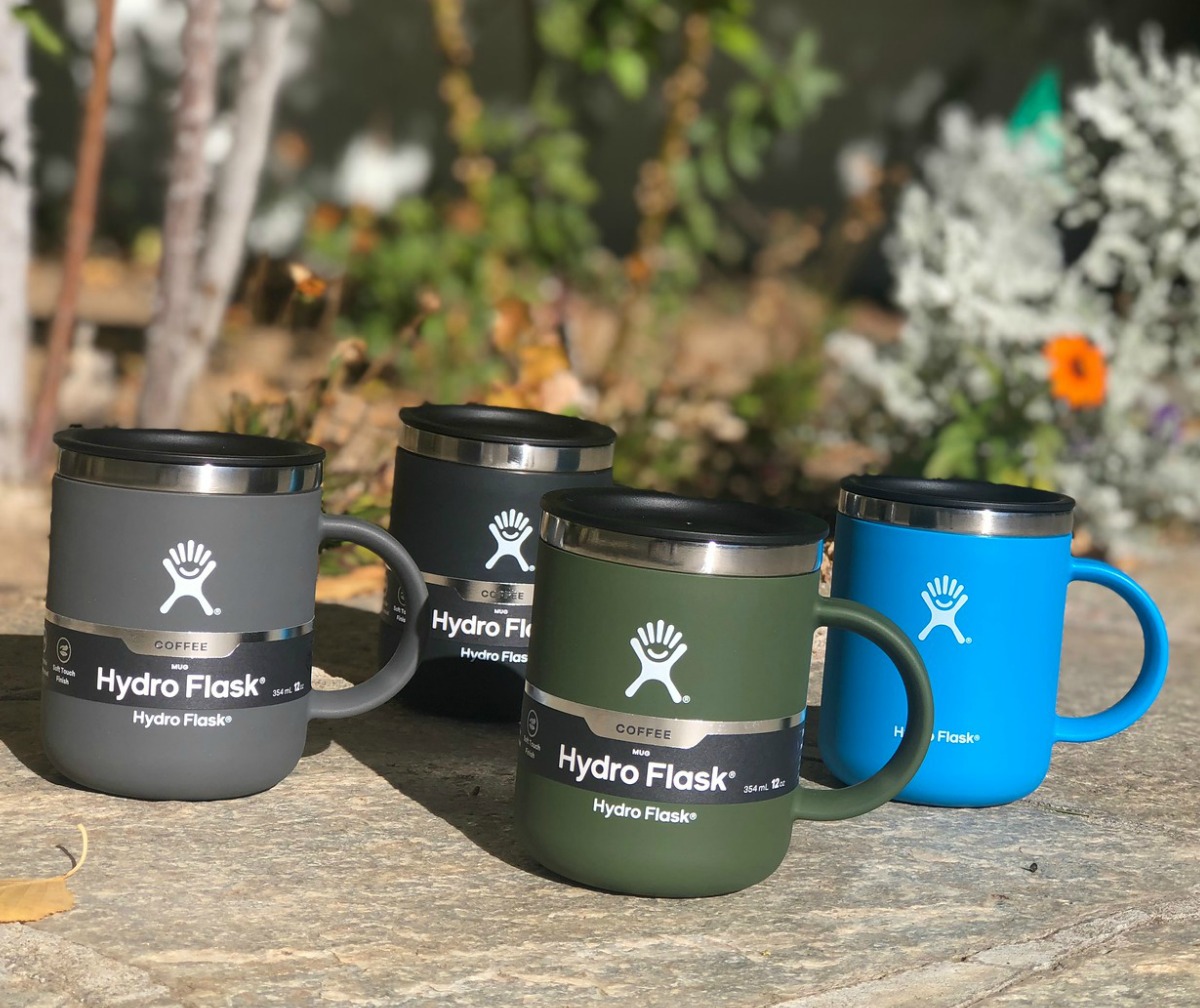 Four Hydro Flask Coffee Mugs in various colors outside