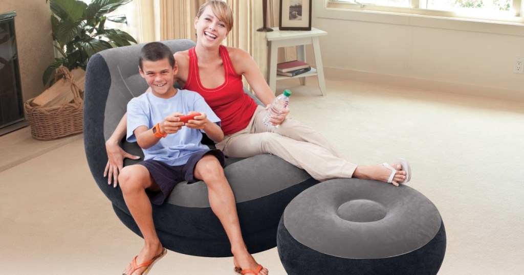 woman and boy sitting on intex inflatable lounge chair