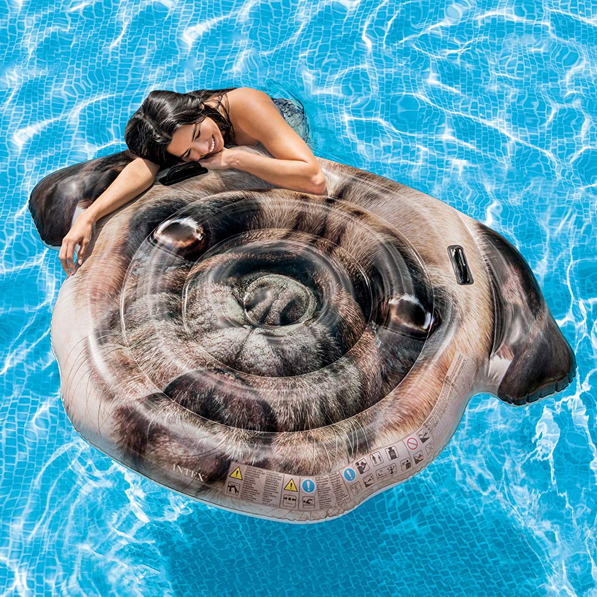 woman on pug pool float
