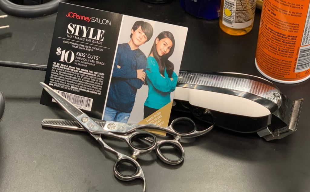 JCPenny Salon Kids' Haircut Coupon with scissors comb and clippers on table