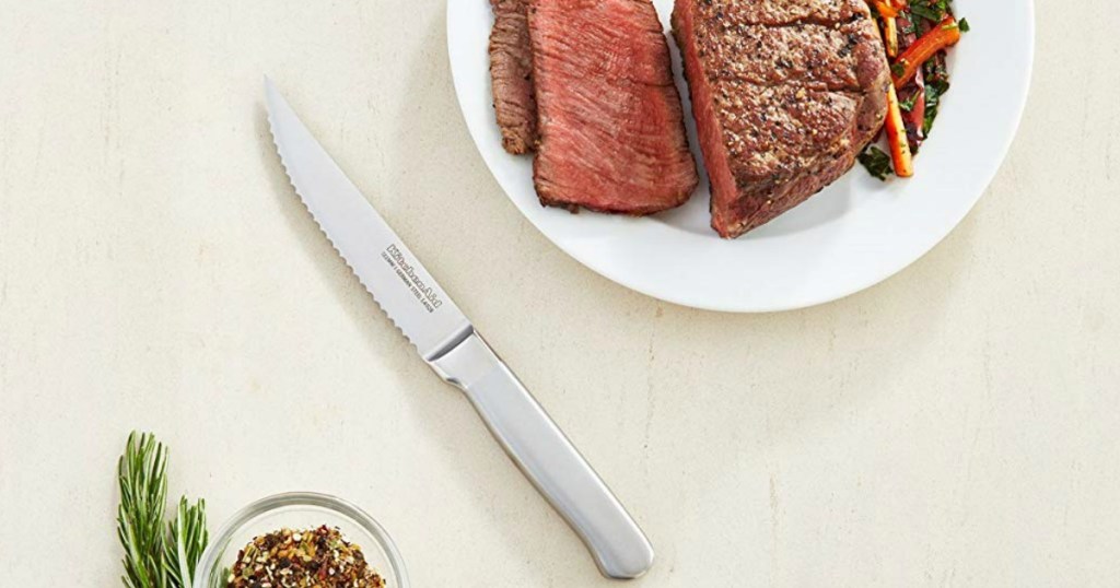KitchenAid Steak Knife lying next to a steak on a plate