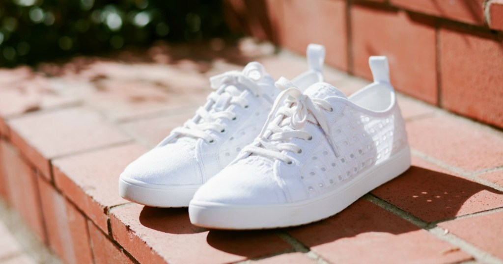 white shoes sitting on brick stairs outdoors