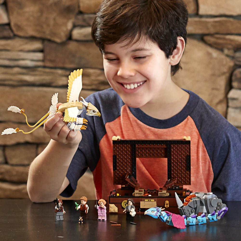 child playing with LEGO Fantastic Beasts Set