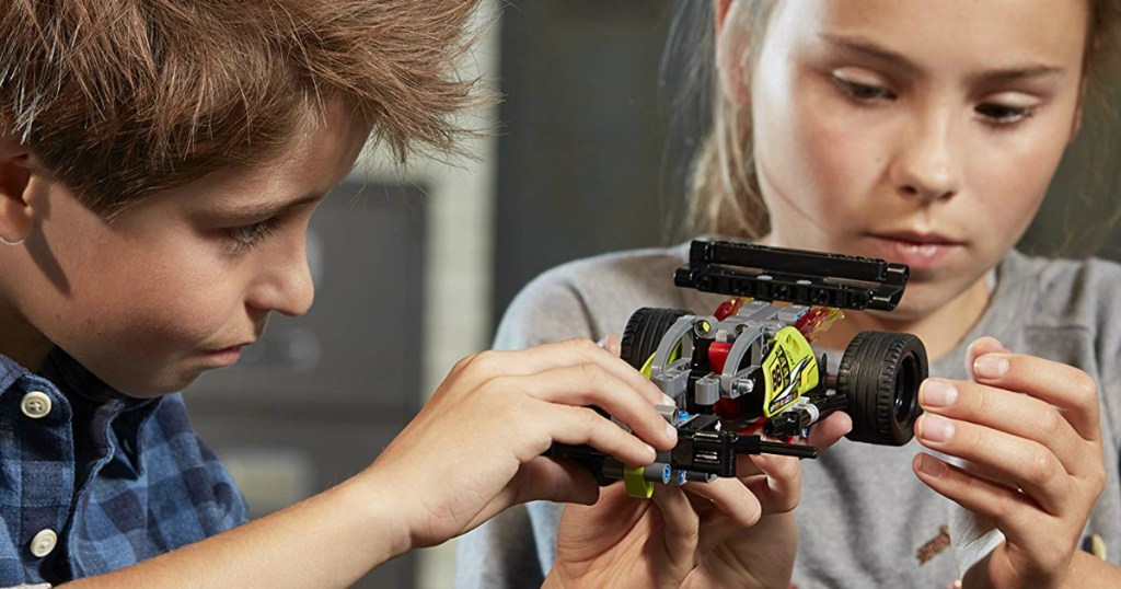 Boy and girl building a LEGO set