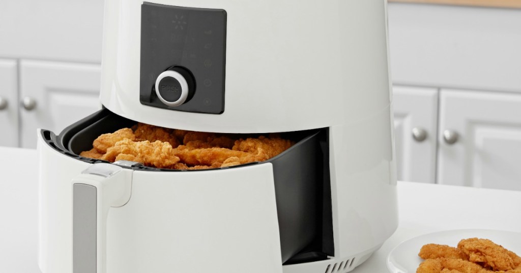 digital air fryer with food in it