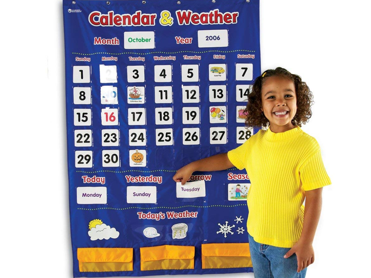 Learning Resources Calendar & Weather Pocket Chart with girl in classroom