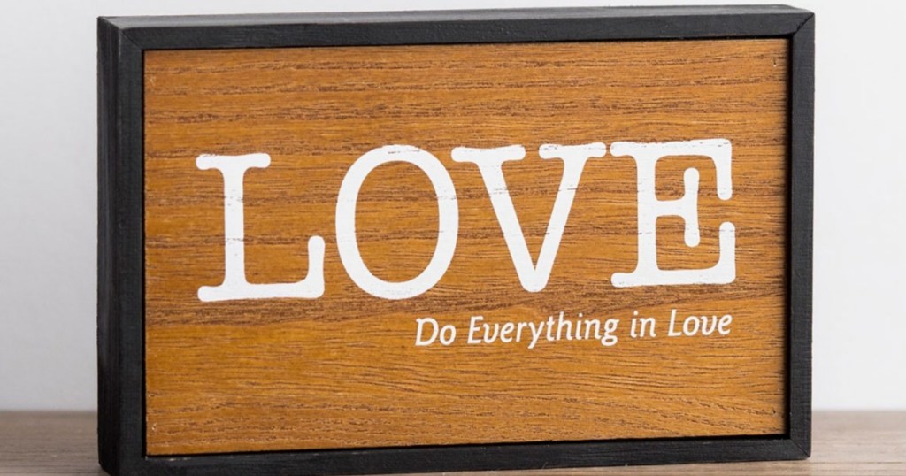 love do everything in love sign