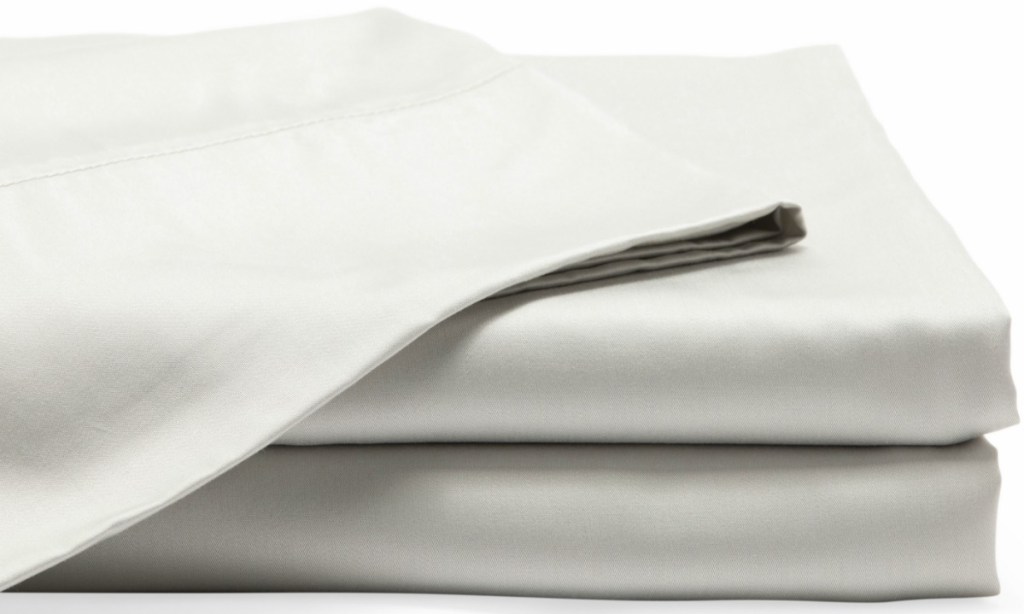 Light Gray fitted and flat sheets folded and stacked