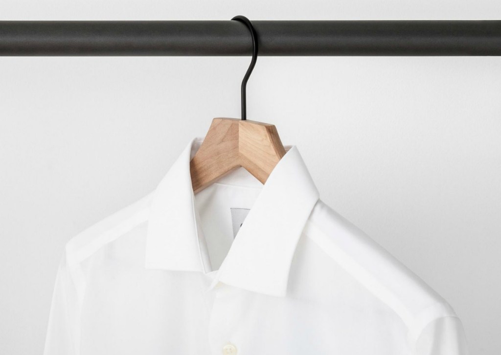 woman's blouse hanging on Made By Design Wood Hanger