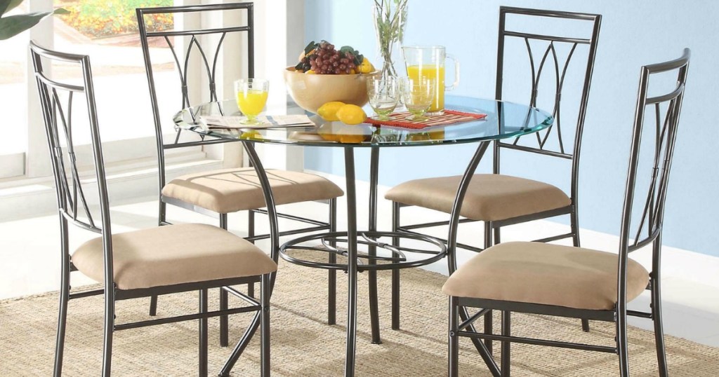 glass and metal dining set with food on table
