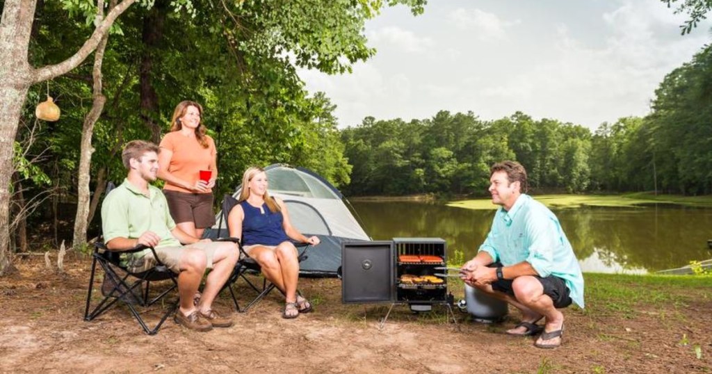 family camping cooking with portable smoker