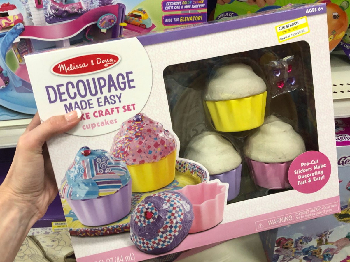 hand holding play cupcake set in box by store display