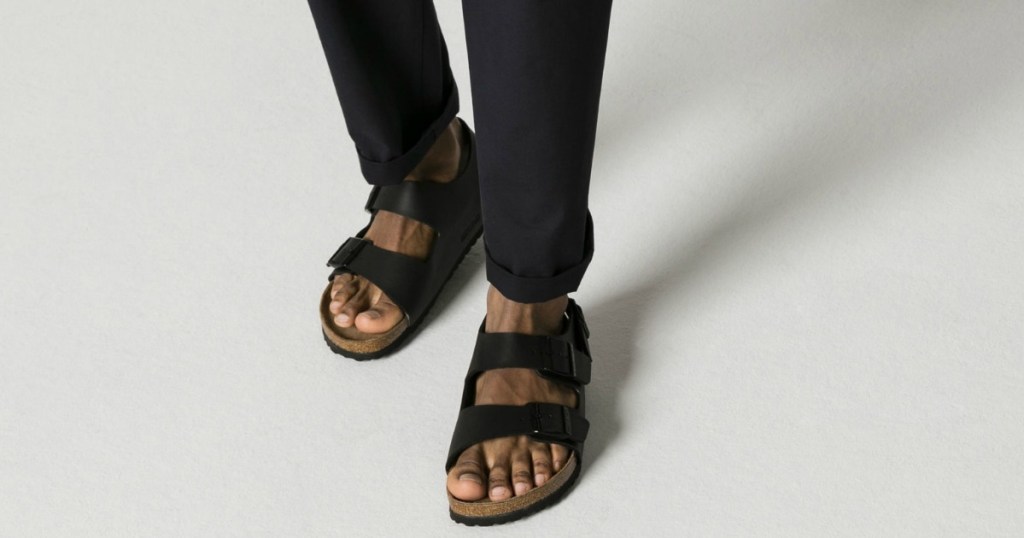 Person wearing Black Milano Birkenstock sandals
