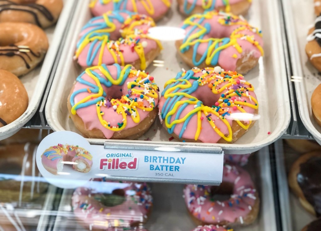 In-store display of birthday batter filled doughnuts at Krispy Kreme