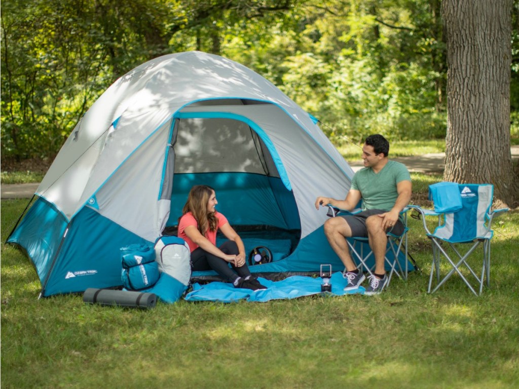 Ozark Trail 28-piece tent in outdoor setting with family