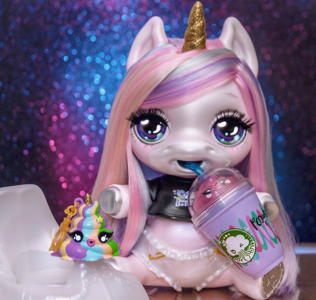 Pink haired unicorn figure with accessories