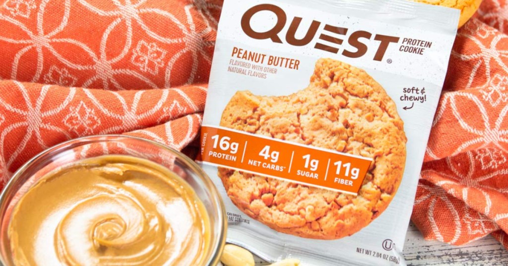 quest protein cookie and bowl of peanut butter