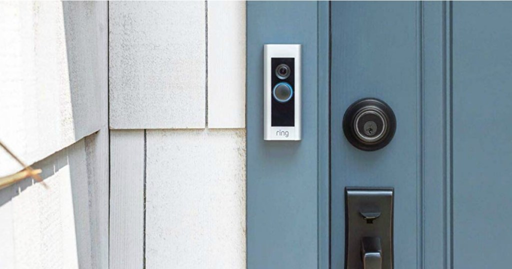 Ring Video Doorbell on house next to blue door