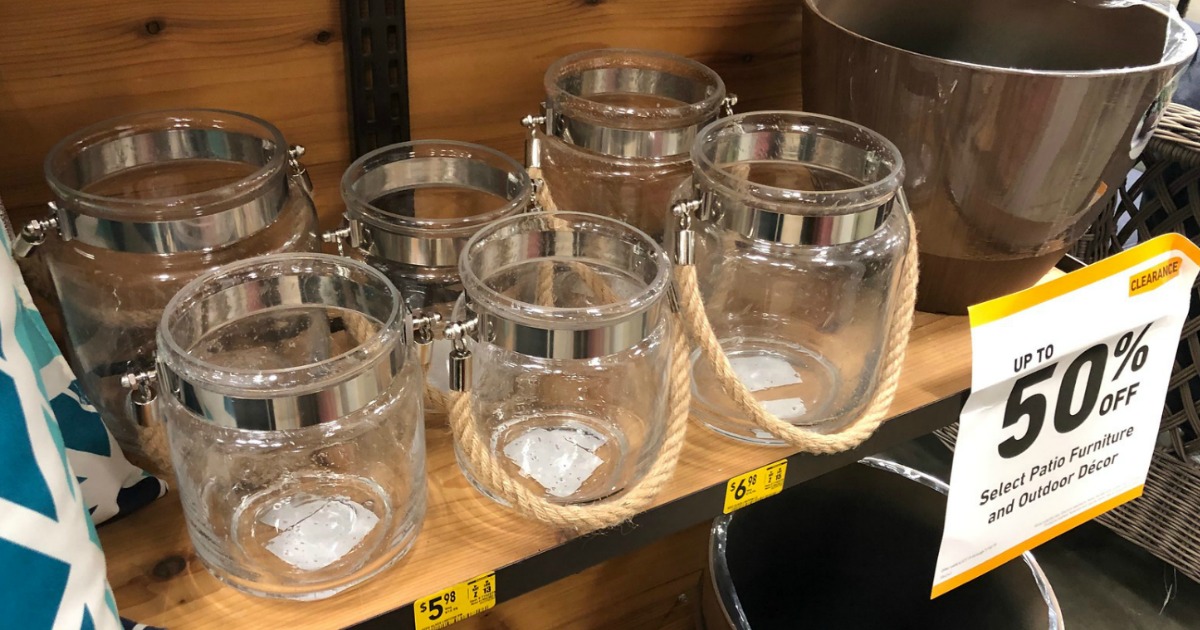 small glass lanterns on store shelf