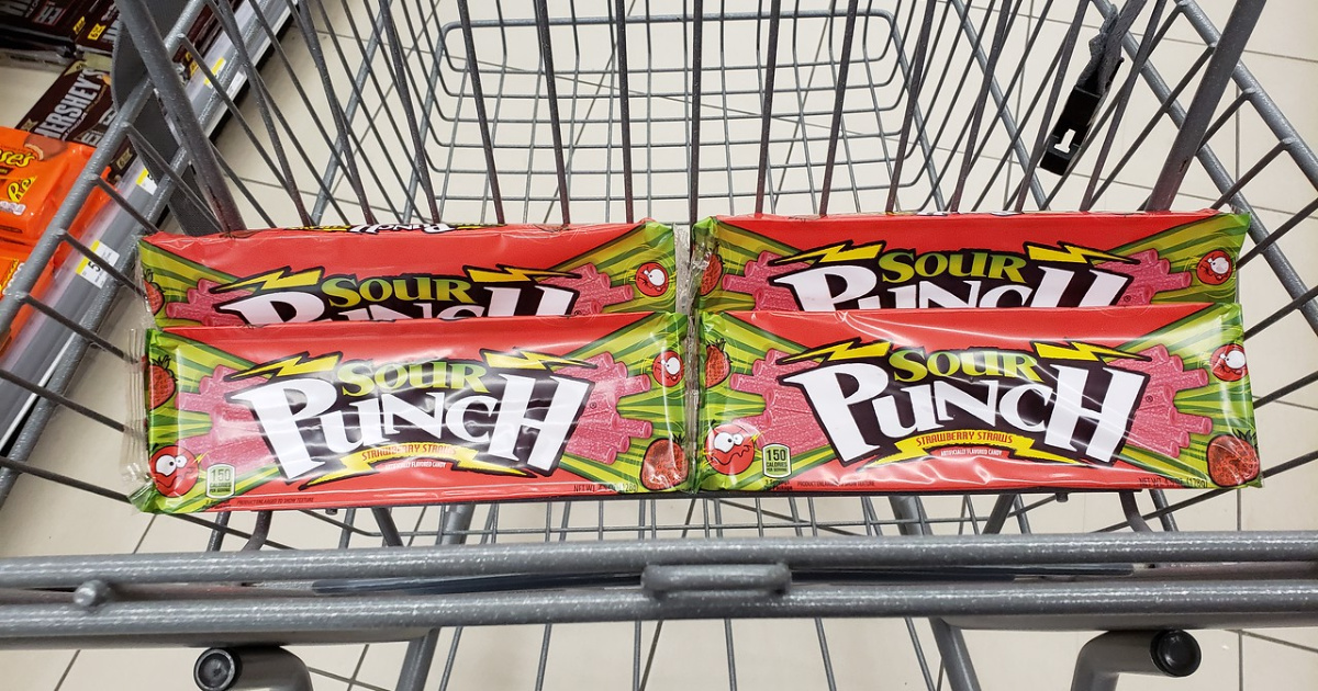 sour punch candy trays in a shopping cart in store