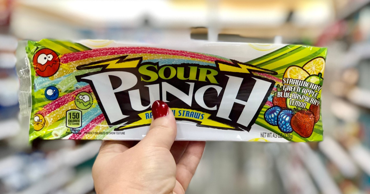 sour punch candy tray being held in hand at a store