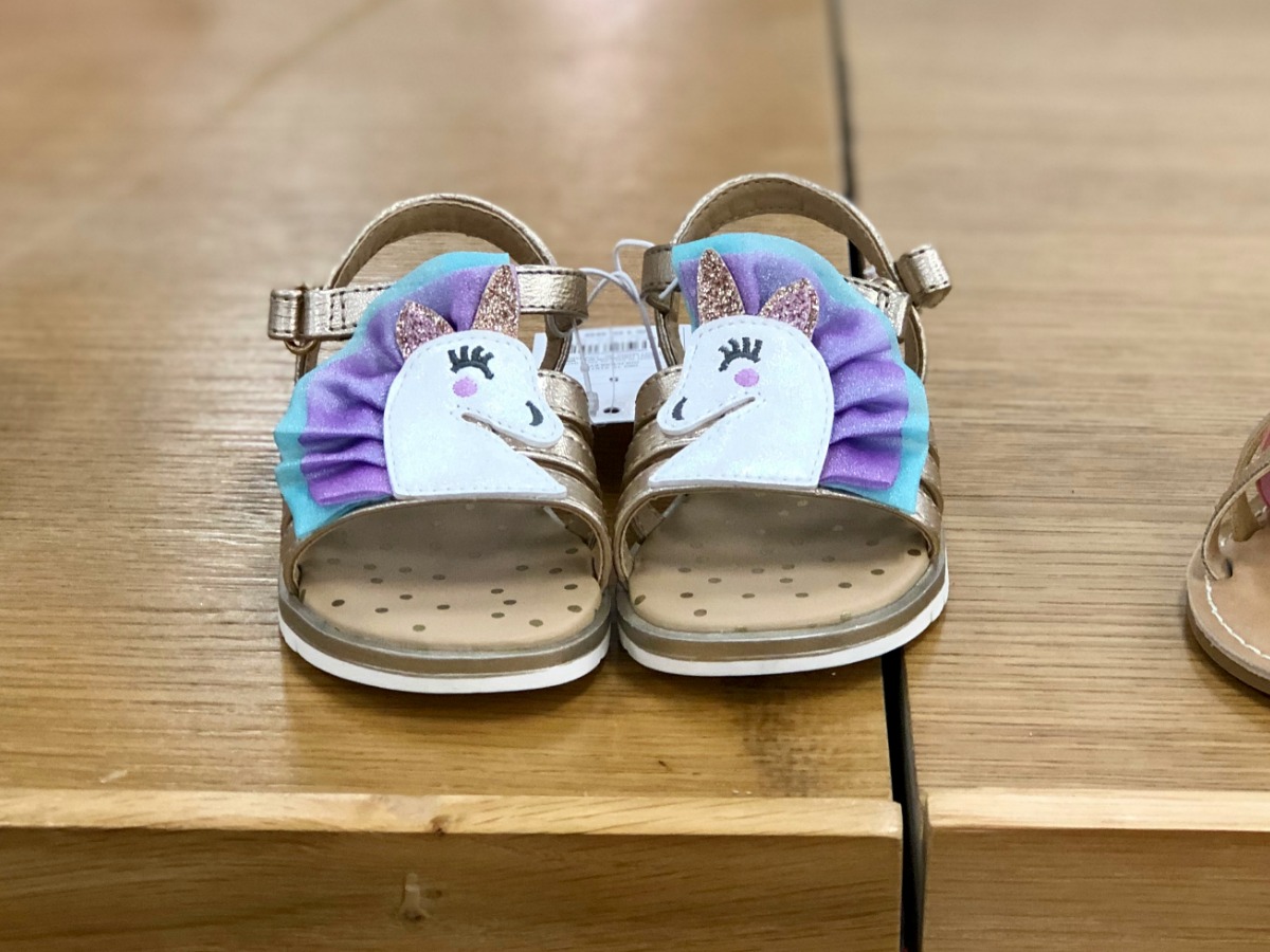Toddler unicorn sandals on shoe shelf at Target