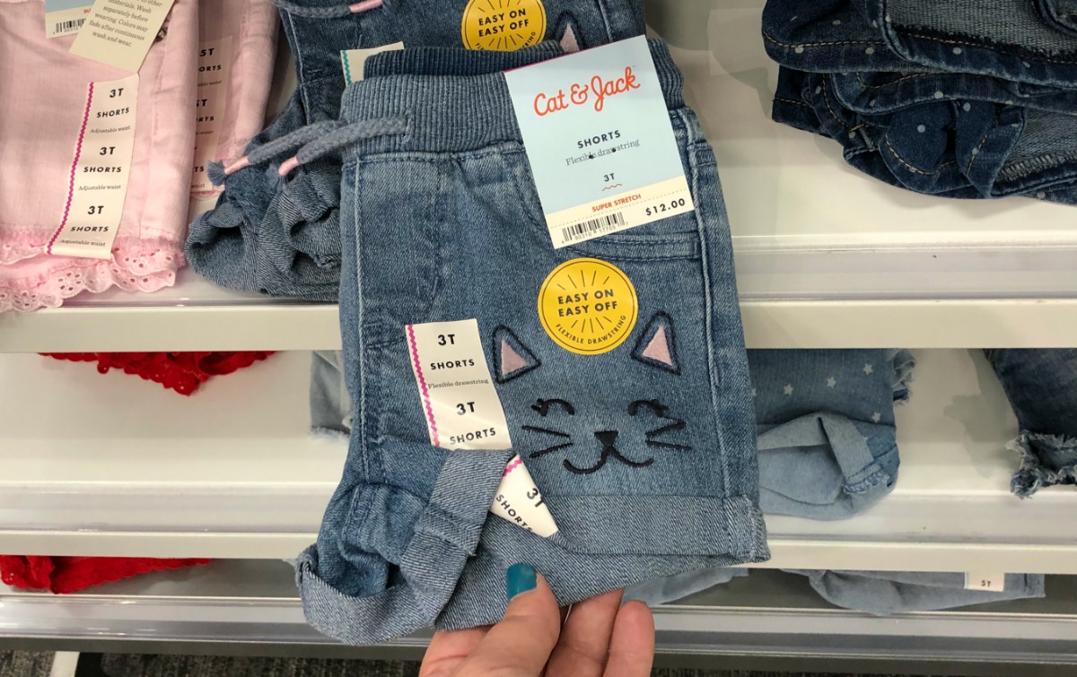 Pair of denim shorts with an embroidered cat face