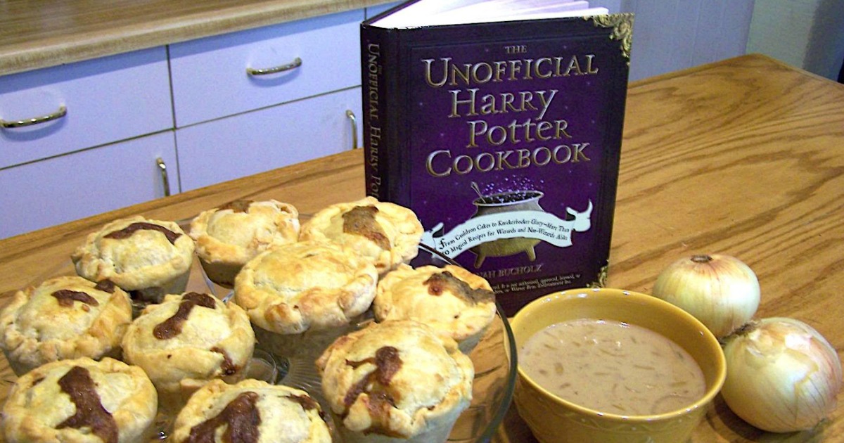 The Unofficial Harry Potter Cookbook on table next to biscuits