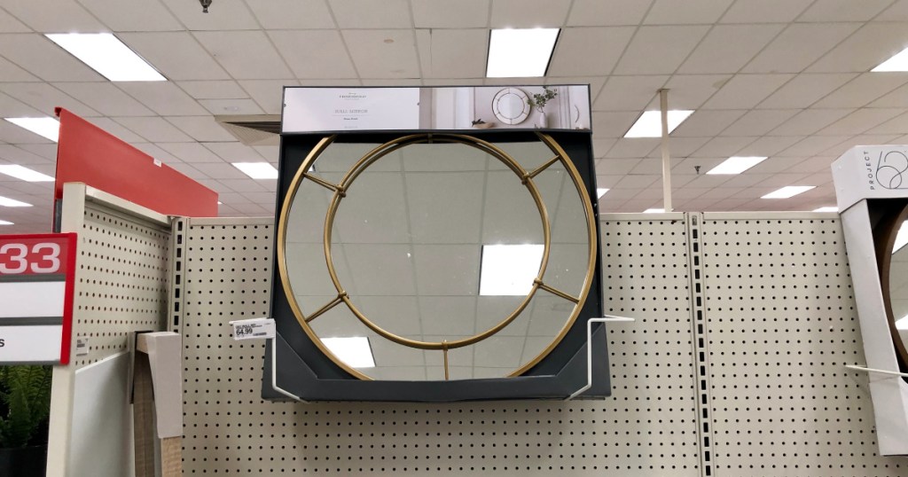 threshold round metal mirror hanging on shelf at target