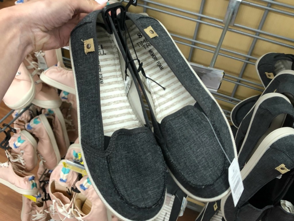 women's shoes that slip on held by hand