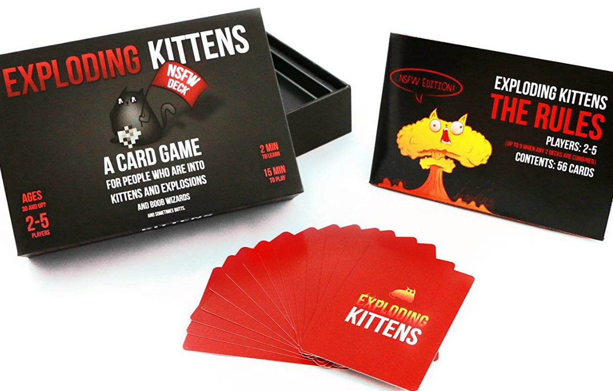 Exploding Kittens NSFW Edition Card Game open with cards spread out