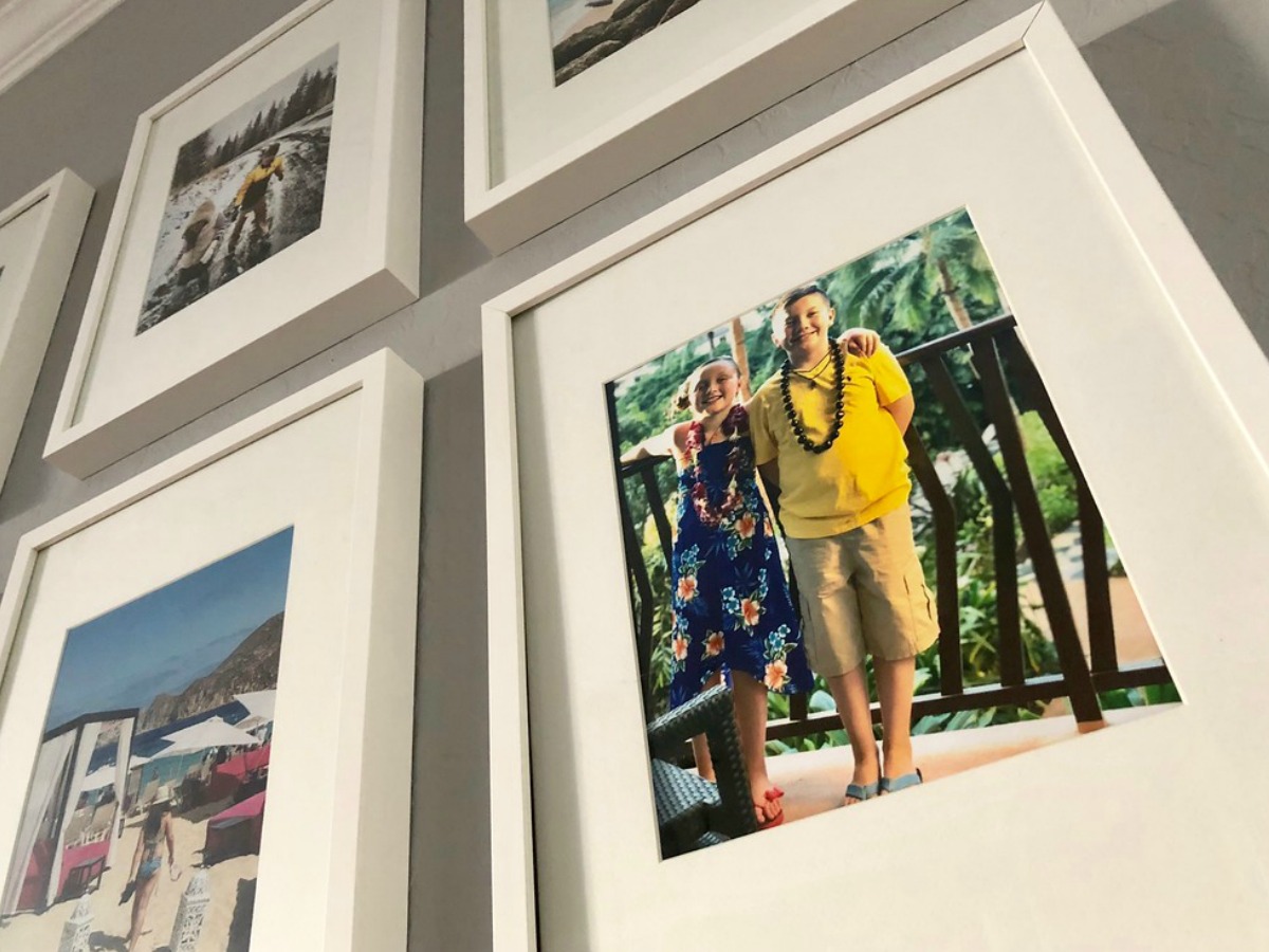 Pictures of photo prints framed on the wall