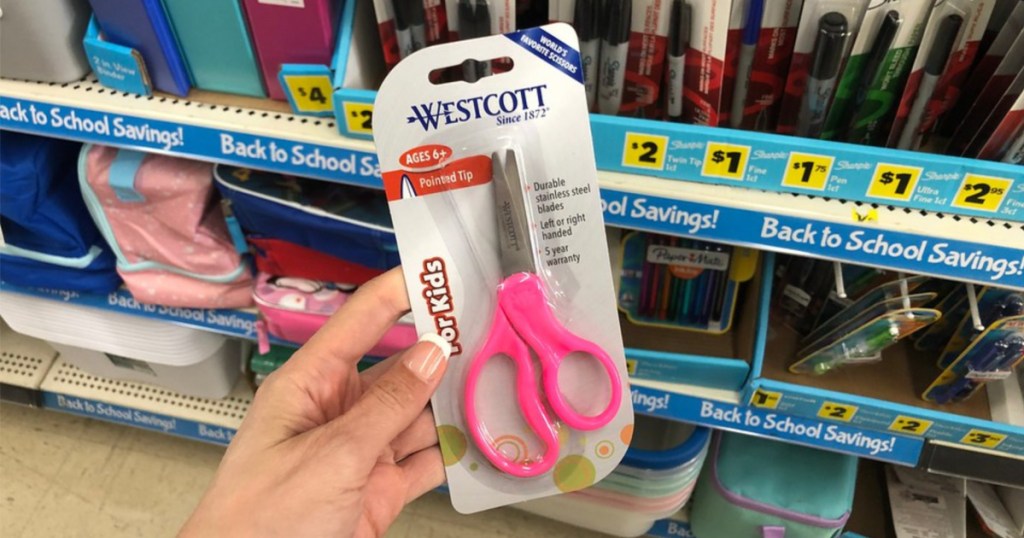 woman holding westcott scissors at dollar general