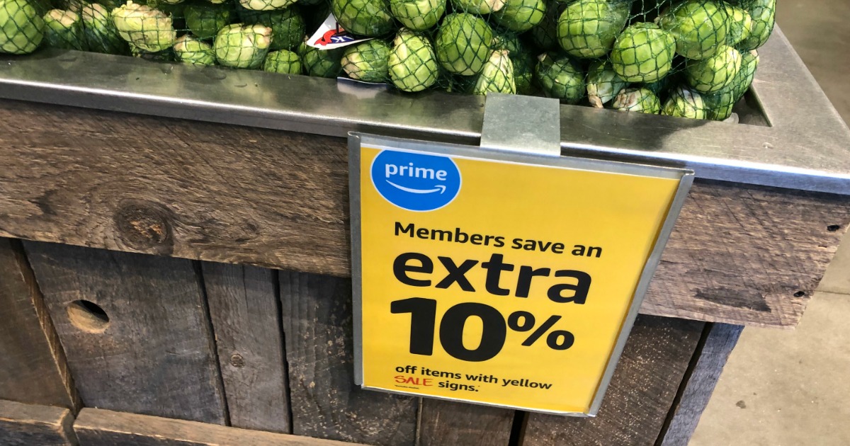 whole foods extra 10% off sign with brussel sprouts