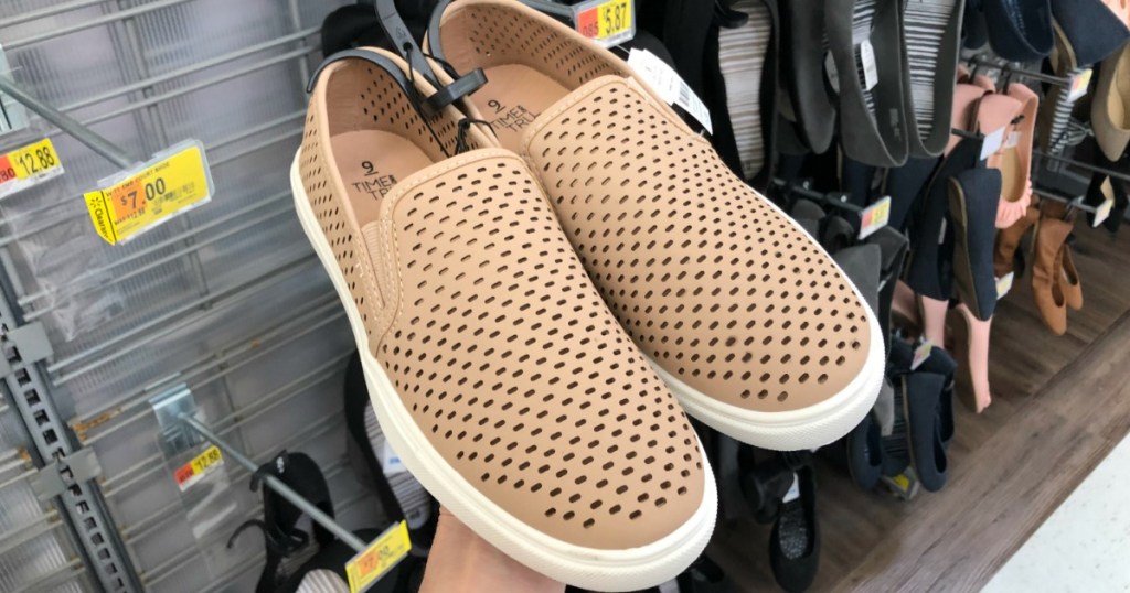 Women's slip on shoes in beige in store display