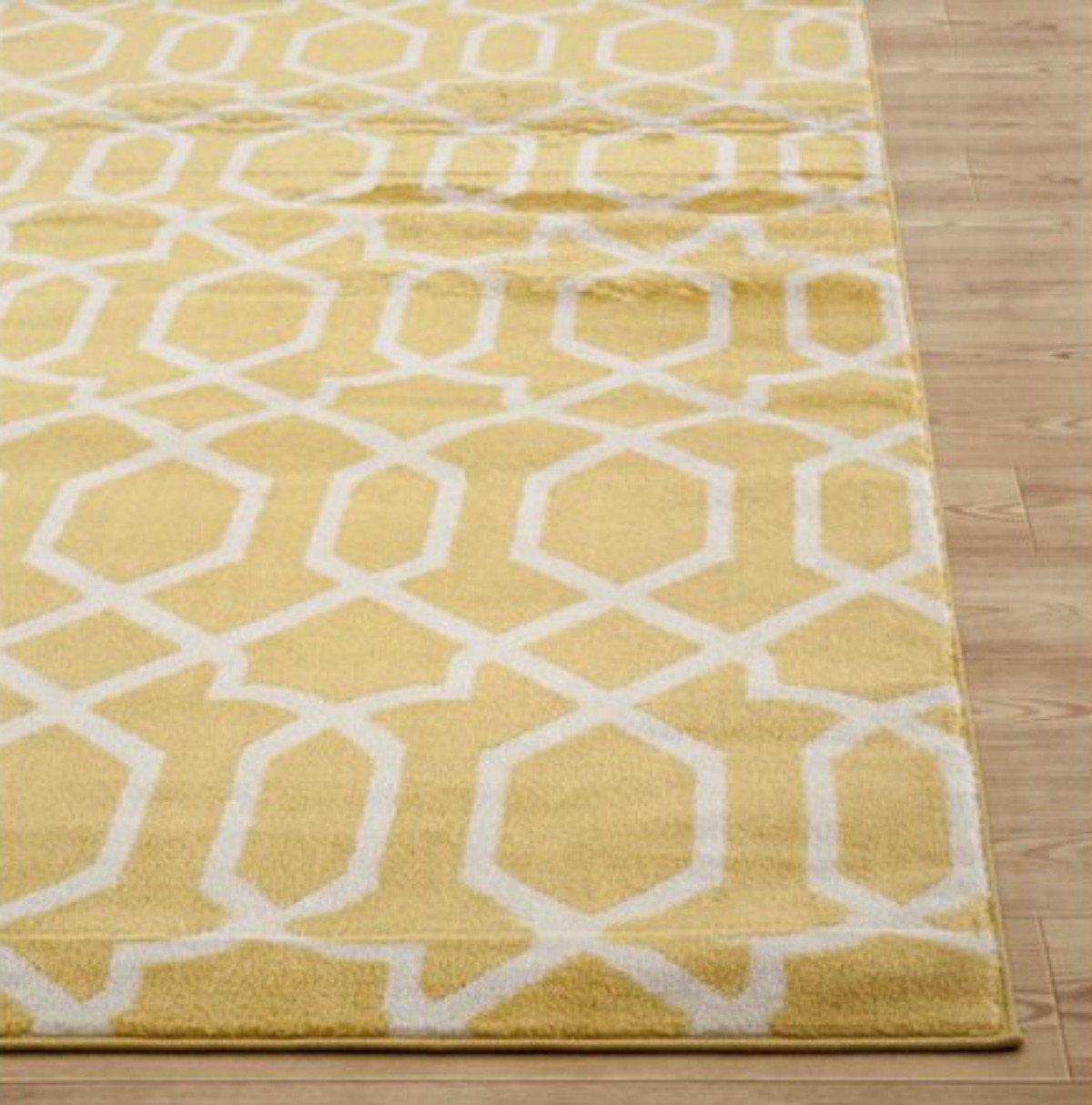 yellow rug with white trellis design
