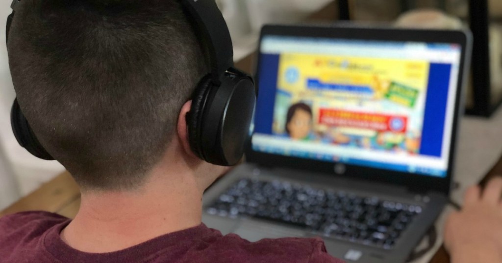 over the shoulder of a boy using ABCmouse
