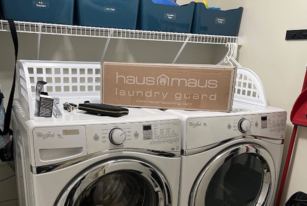 laundry appliances with plastic guard on top
